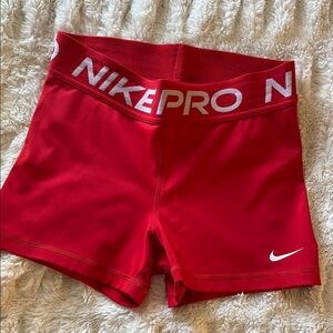 red nike pro shorts